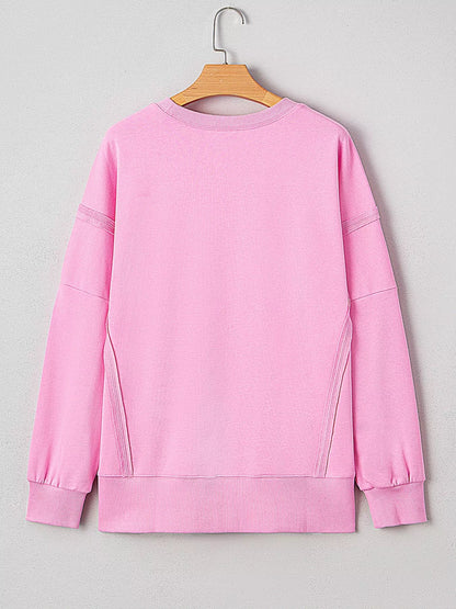 Sequin XOXO Letter Graphic Exposed Seam Baggy Sweatshirt - Rochelle's House LLC