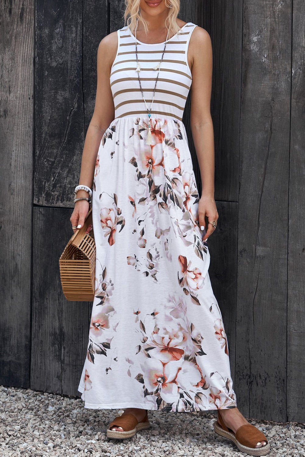 Front view of Striped Floral Round Neck Sleeveless Maxi Dress in Floral showing neckline and sleeve details