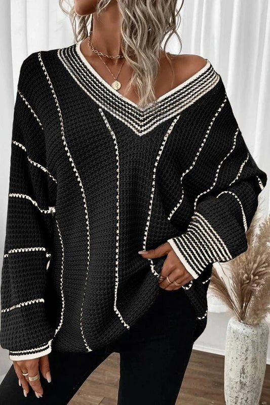 Front view of Striped V-Neck Long Sleeve Sweater in Black showing neckline and sleeve details