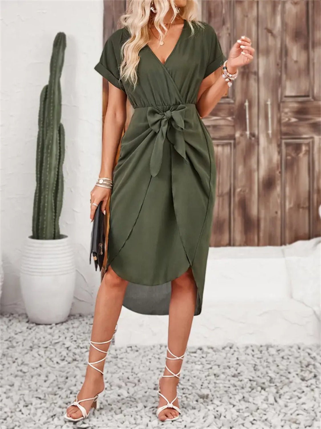 Front view of Tied Surplice Short Sleeve Dress in Dark Green showing neckline and sleeve details