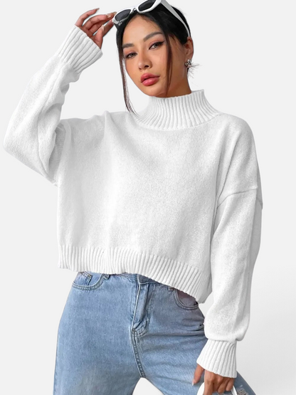 Front view of Turtleneck Long Sleeve Sweater in White showing neckline and sleeve details (100% polyester Care instructions)