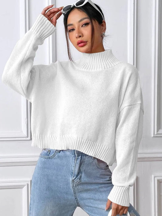 Front view of Turtleneck Long Sleeve Sweater in White showing neckline and sleeve details (100% polyester Care instructions)