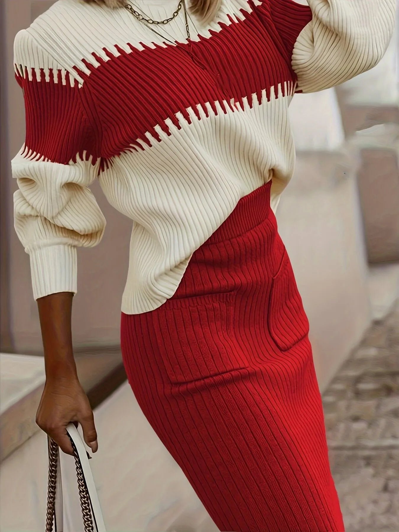 Front view of Two-Tone Ribbed Knit Top and Skirt Sweater Set in Red showing neckline and sleeve details