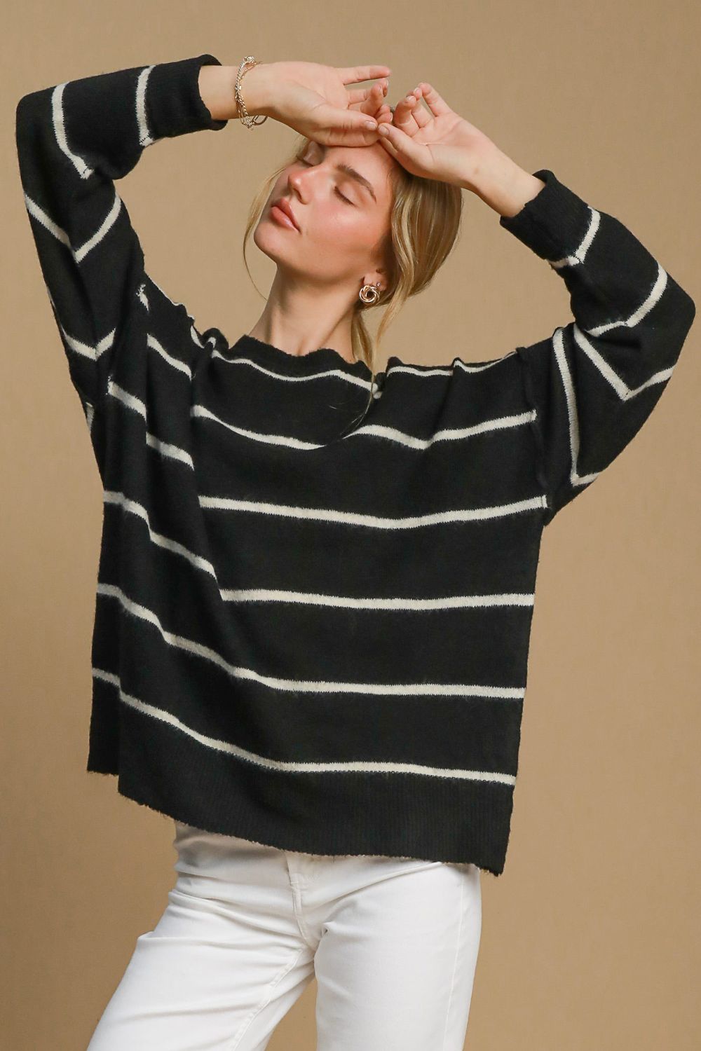 Front view of Umgee Wool Blend Striped Round Neck Sweater in Black/Cream showing neckline and sleeve details