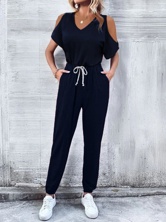 Front view of V-Neck Cold-Shoulder Jumpsuit with Pockets in Dark Blue showing neckline and sleeve details