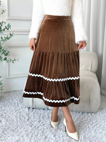 Front view of Velvet Tiered Midi Skirt in Brown showing neckline and sleeve details