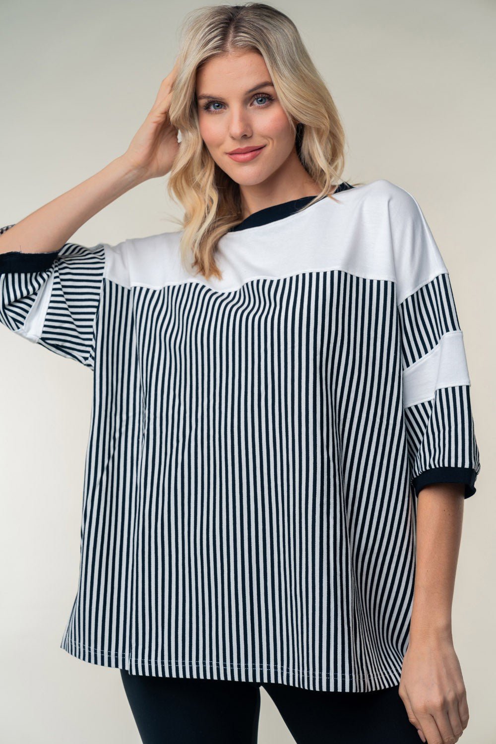 Front view of White Birch Full Size Striped Contrast Round Neck Top in Black showing neckline and sleeve details