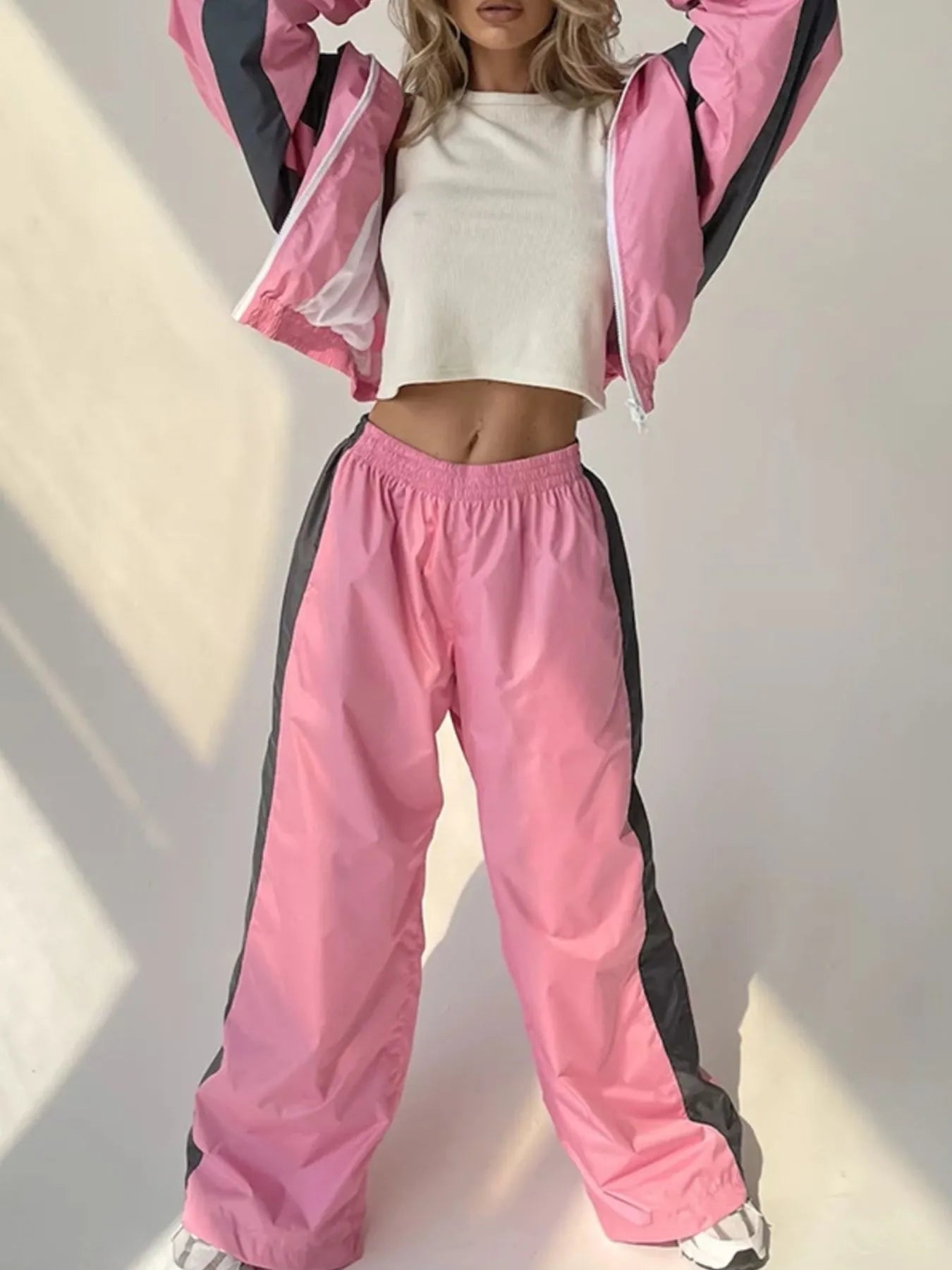 Front view of Zip Up Long Sleeve Top and Pants Set in Dusty Pink showing neckline and sleeve details