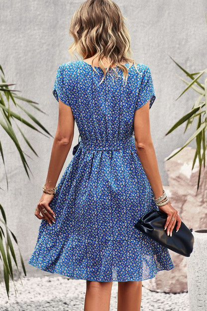 Floral Elegance - Belted Round Neck Petal Sleeve Mini Dress for Chic Occasions Cobalt Blue Back